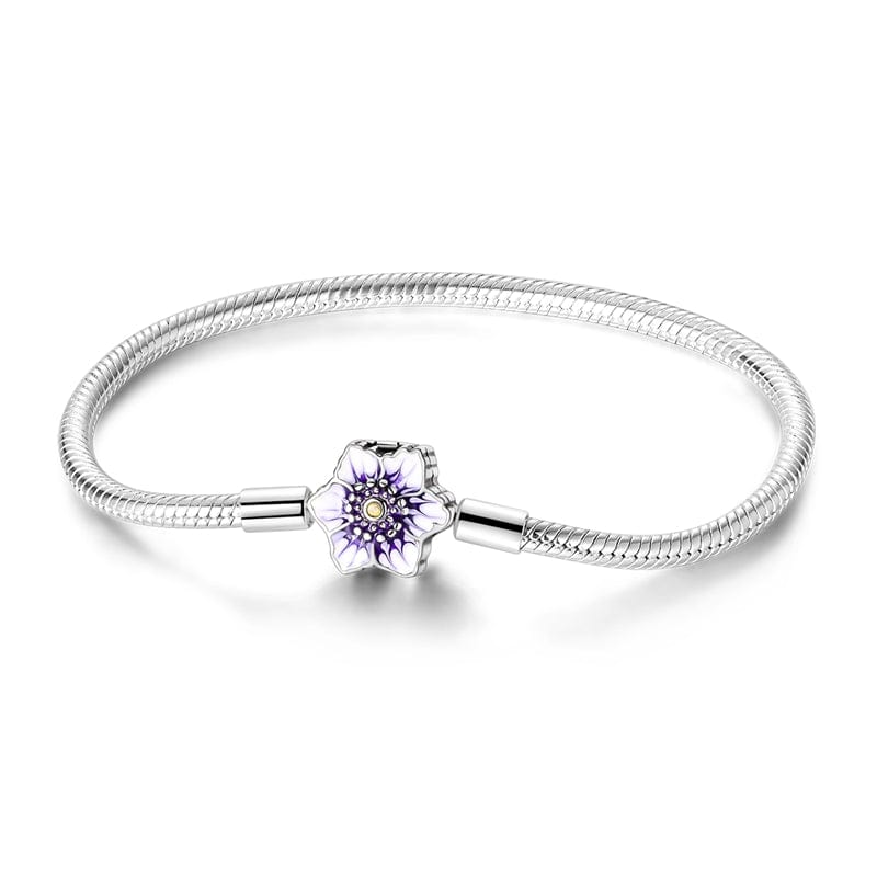 Pulsera con dije de flor morada