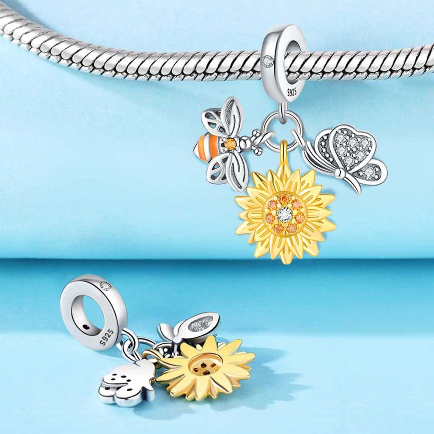 Dije de girasol, abeja y mariposa