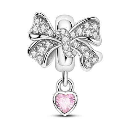 Sparkling Bow with Pink Heart Charm